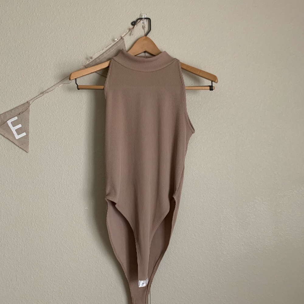 Tan, ribbed onesie! Lightly loved